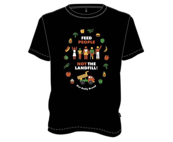 A black t-shirt with a bold, colorful, stylized graphic on it. There is text that says “Feed people”, then five diverse little figures, then “not the landfill!”, then a dump truck, then “Our Daily Bread”. An oval of illustrations of food surrounds everything. The figures all have different skin colors and clothing that are the colors of the graphic around them- white, yellow, green and red. One medium sized, thin figure has its arms raised and is wearing a dress. One is shorter and thinner and has a hand on its hip, a t shirt and pants. One has its hands at its sides and a top and skirt. One is holding a crutch on one side, its leg ending at the knee, wearing a t shirt and shorts. One is taller, waving one arm high, wearing bell bottoms and a long sleeved shirt. The dump truck is rounded and stylized. The food in the oval formation is red, yellow and green bell peppers, peas, a burger, a banana, broccoli, avocados, a hot dog, red and green apples, a kiwi, a hot dog, and a cupcake.